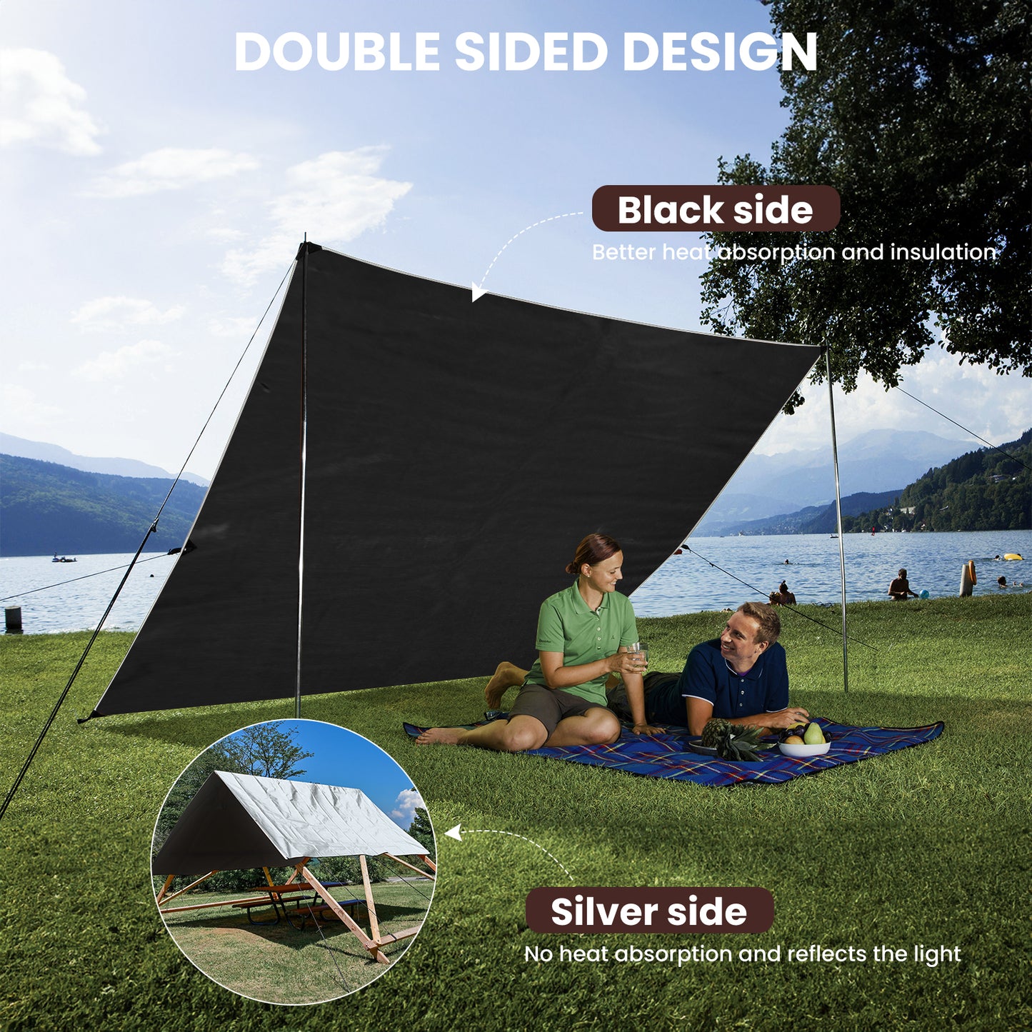 Black and silver double-sided shade sail with people sitting underneath by a lake.